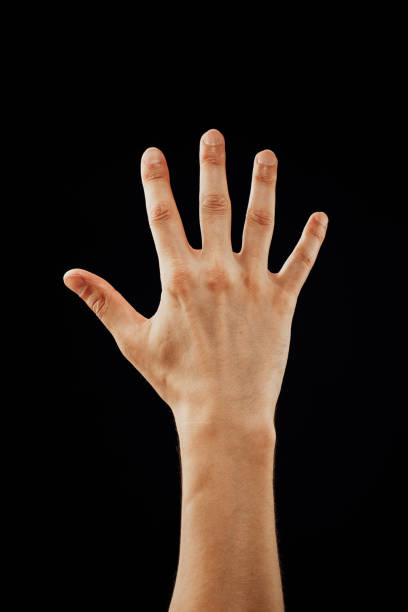 istock male hand, isolated on black 1067604266