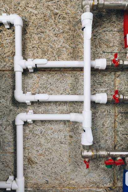 istock white plastic pipes in boiler room 1067606286