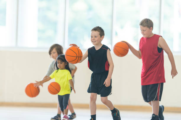 istock Dribbling basketballs 1067606794