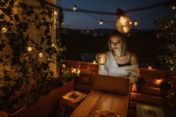 istock Happy woman using laptop 1067608474