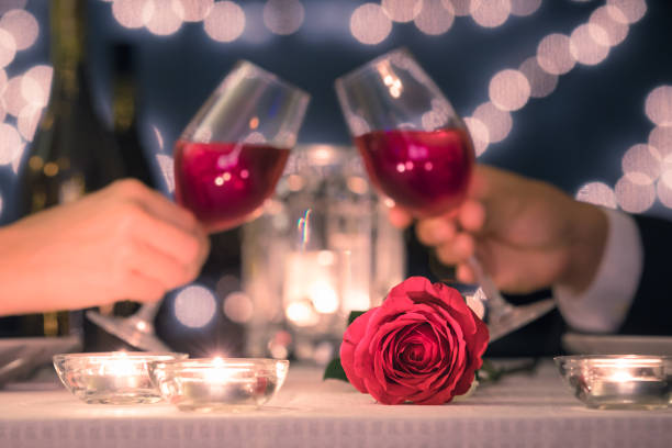 istock Couple enjoying romantic candle light dinner. 1067611968