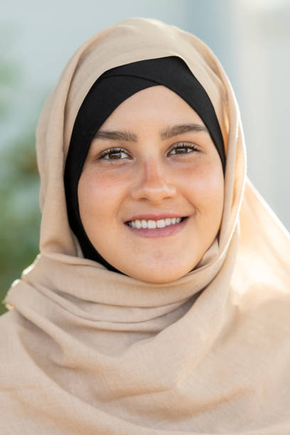 istock Smiling young muslim woman looking at the camera 1067620738