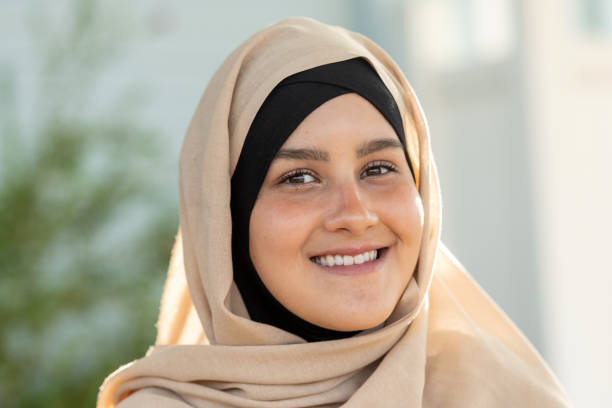istock Smiling young muslim woman looking at the camera 1067621850
