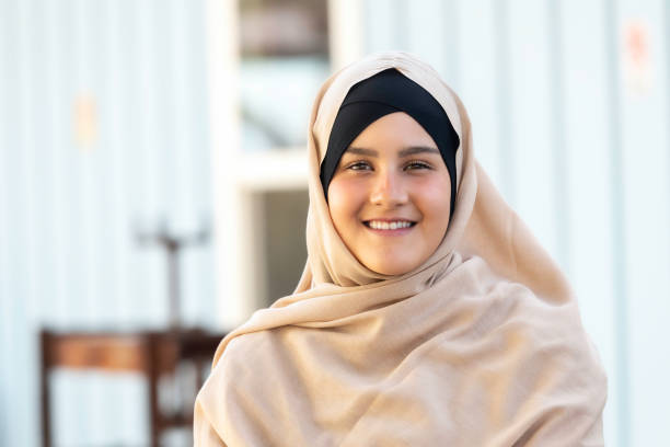 istock Smiling young muslim woman looking at the camera 1067627328