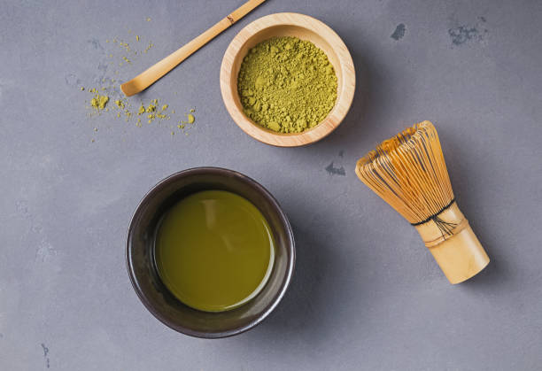 istock Traditional atcha tea making accessories on the grey color background 1067628260