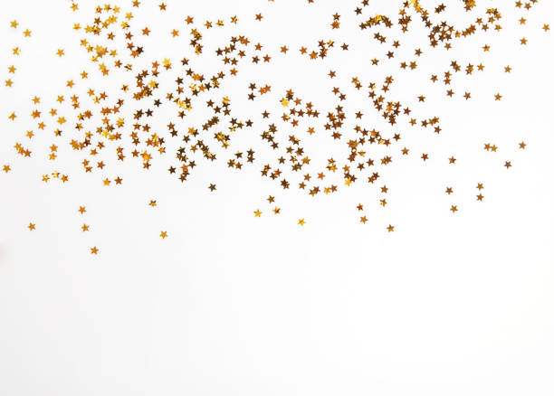 istock Golden glitter decor on the white background with copy space 1067628264