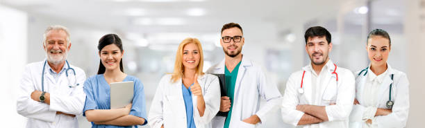 istock Doctor working in hospital with other doctors. 1067641214