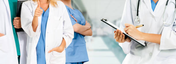 istock Doctor working in hospital with other doctors. 1067642502