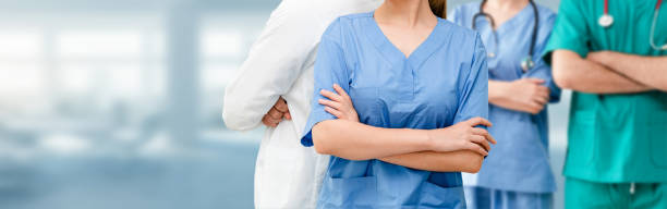 istock Doctor working in hospital with other doctors. 1067642522