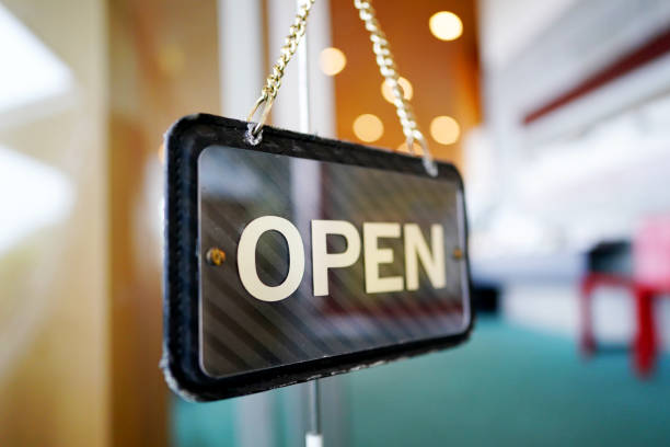 Open sign on cafe hang on door 4