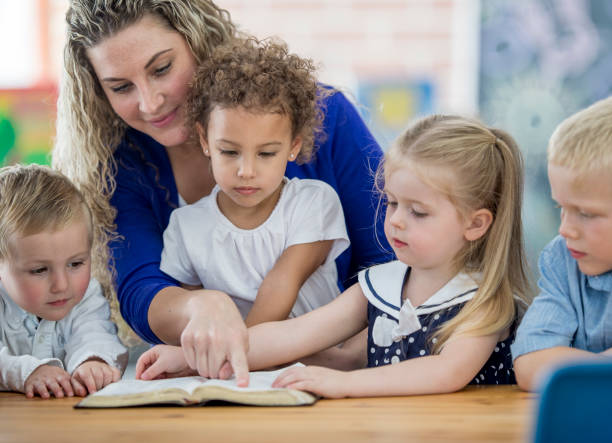 Sunday school teacher and pupils