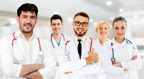 istock Doctor working in hospital with other doctors. 1067650876