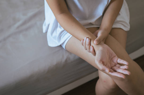 istock Woman hand checking her pulse with fingers in wrist 1067655116