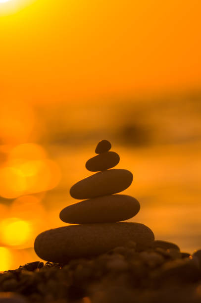istock stack of zen stones on pebble beach 1067657058