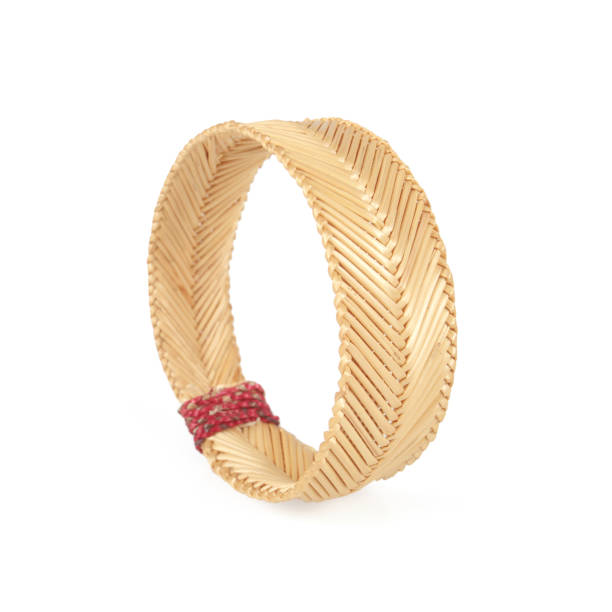 istock wristband made from woven straw on a white background 1067659102