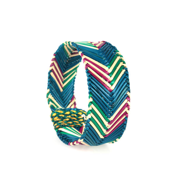 wristband made from woven straw on a white background.
