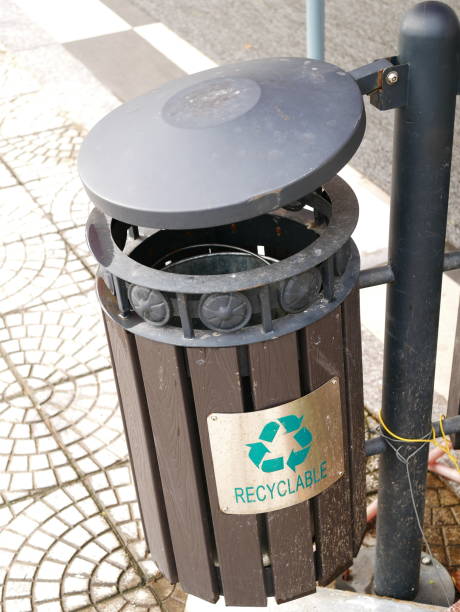 istock Recycling bin on walk Street 1067659512