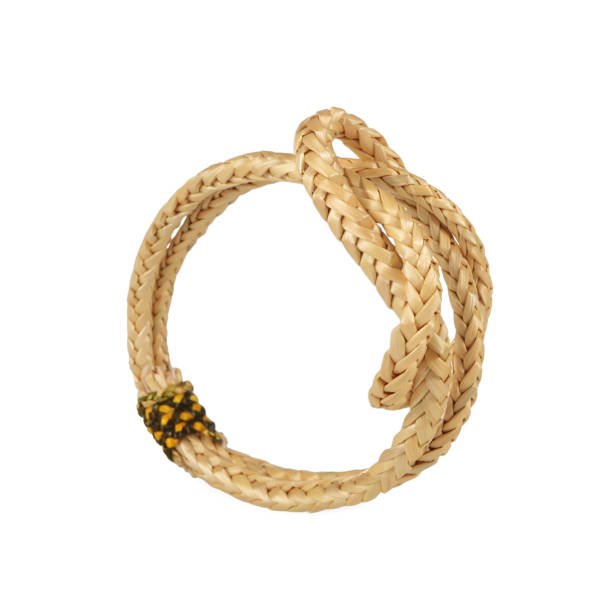 istock wristband made from woven straw on a white background 1067659732