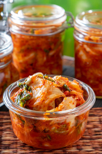 Homemade Kimchee Kimchee in glass jar Kimchi stock pictures, royalty-free photos & images