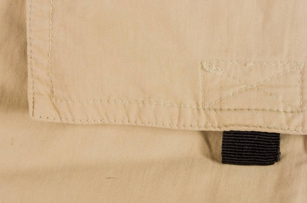 istock clothing items washed cotton fabric texture with seams 1067660990