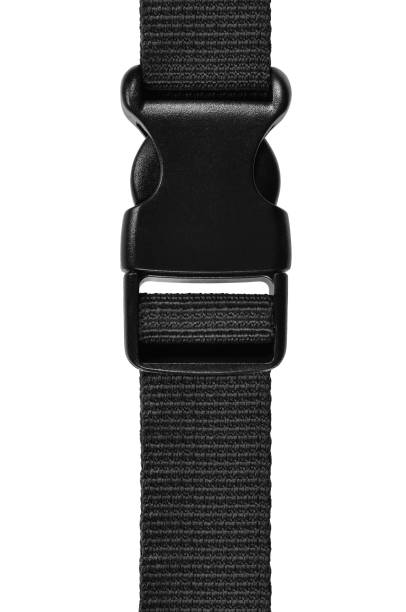 istock Black side release acculoc buckle plastic clasp, quick nylon belt rope lock strap, isolated macro closeup, large detailed vertical accessory studio shot 1067661268