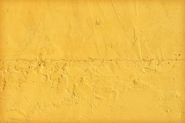 istock Yellow walls crack background 1067663950