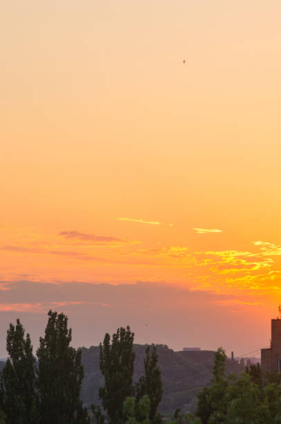 istock Landscape with dramatic light - beautiful golden sunset with saturated sky and clouds. 1067664488