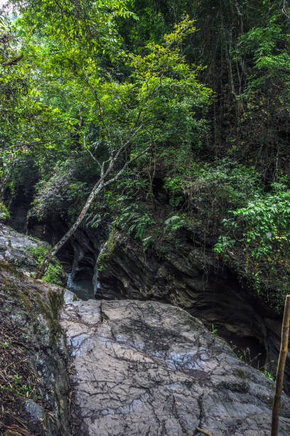 istock beautiful view of blue stream waterfall 1067668928