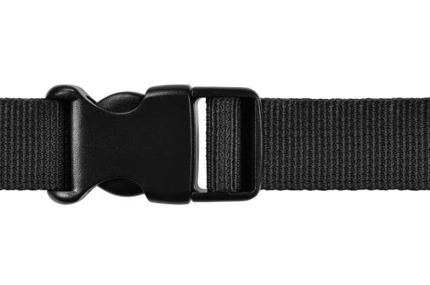 istock Black side release acculoc buckle plastic clasp, quick nylon belt rope lock strap, isolated macro closeup, large detailed horizontal accessory studio shot 1067670466
