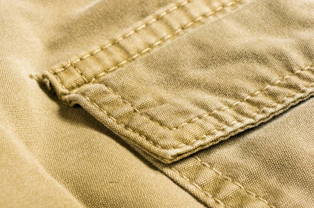 istock clothing items washed cotton fabric texture with seams 1067671198