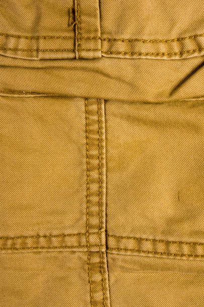 istock clothing items washed cotton fabric texture with seams 1067673340