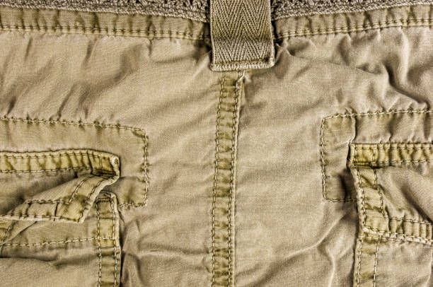 istock clothing items washed cotton fabric texture with seams 1067677188