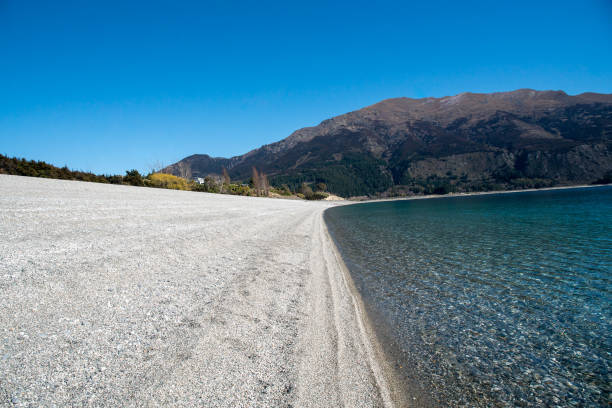 istock Lake scenery in a snow capped mountain national park 1067679476