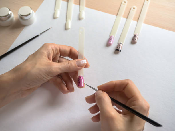 istock Drawings on the nails. Manicure design concept. 1067679516