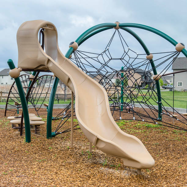 istock Playground with slide on a residential area 1067685914