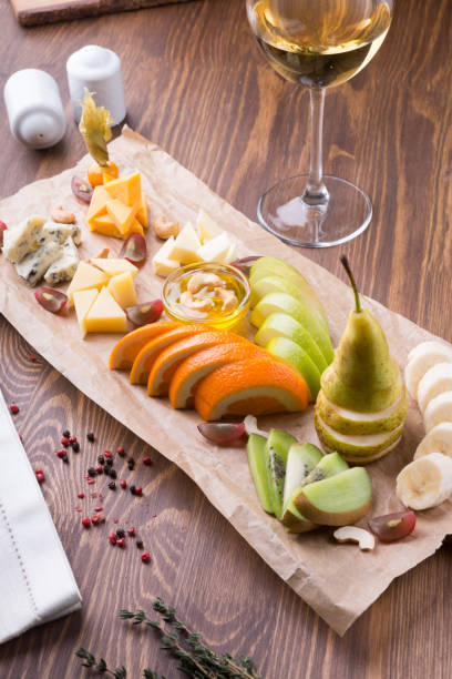 Fruit platter full of snacks for white wine