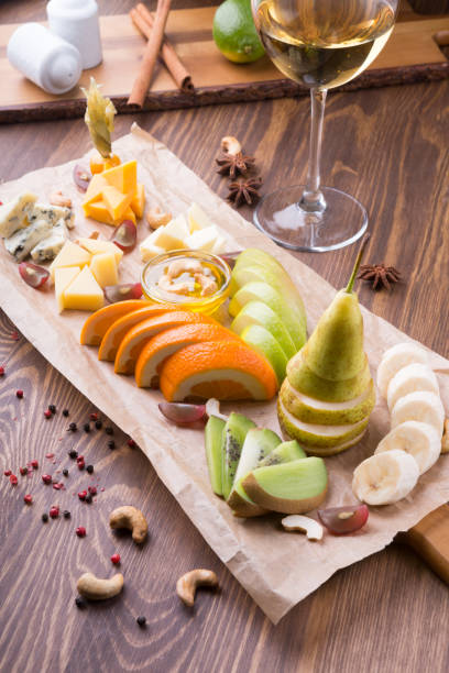 istock Fruit platter full of snacks for white wine 1067694136