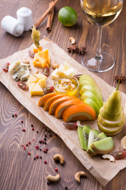 Fruit platter full of snacks for white wine