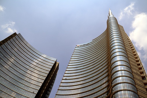 The modern Unicredit Tower, a 231 metres tall skyscraper in Milano, Italy. 
The building was designed by architect Cesar Pelli and is the headquarters of UniCredit, Italy's largest bank by assets. The Unicredit Tower's height includes a spire of approximately 84 meters.