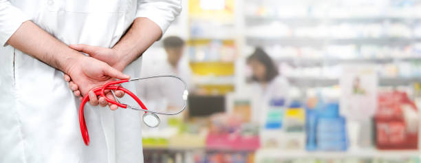 istock Male pharmacist working at the pharmacy. 1067707554