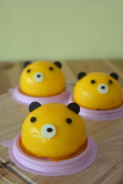 istock Homemade  Orange Teddy Bear's Head Chiffon Cake 1067707946