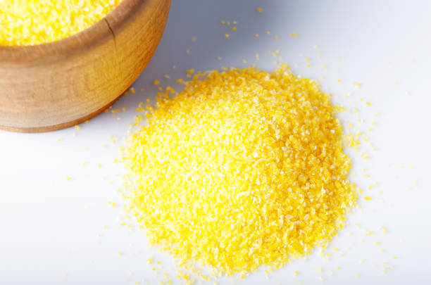 istock Bowl of Corn grits on white background 1067710794