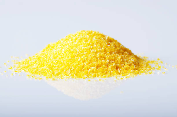 istock Heap of Corn grits isolated on white background 1067712738