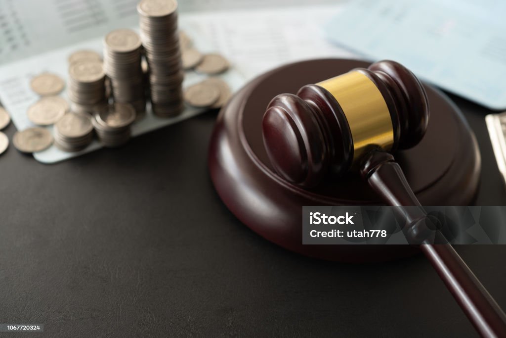 law legal money finance gavel judge with coin money and book bank accounts. banking money finance law. Law Stock Photo