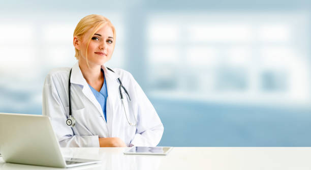 istock Doctor using laptop computer at the hospital. 1067720402