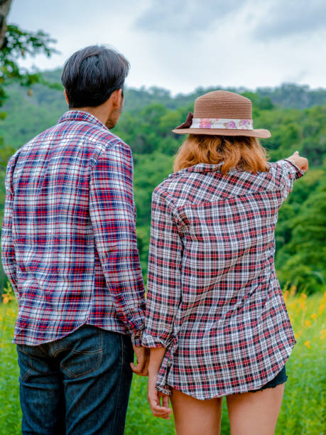 istock Happy couple take a romantic walk on the hills. 1067723364