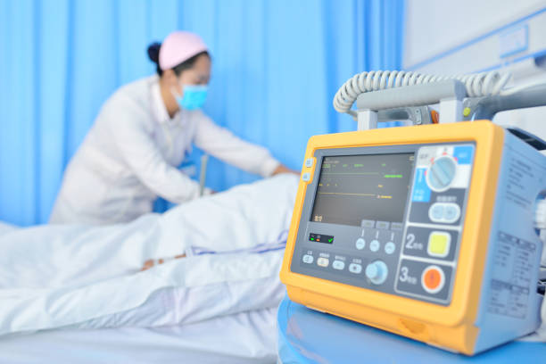 istock Examining with Patient in Hospital Ward 1067724018
