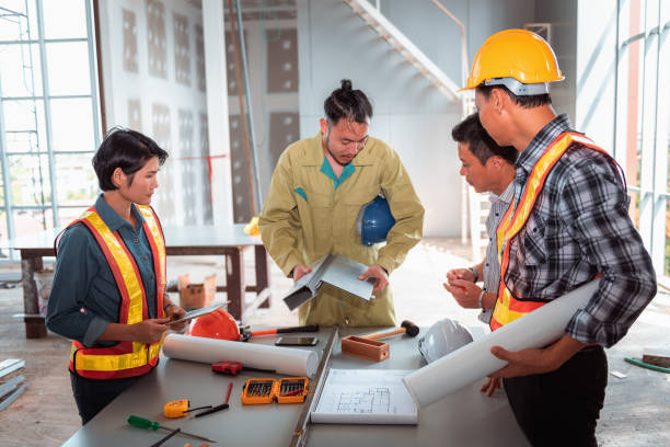 istock Project management team of engineers and architects planing brainstorming for new project, Business construction concept 1067729340