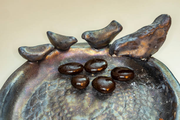 istock chocolate dragees in a bird figured ceramic plate 1067731612