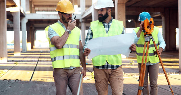 istock Team of architects people in group on construciton site 1067734302